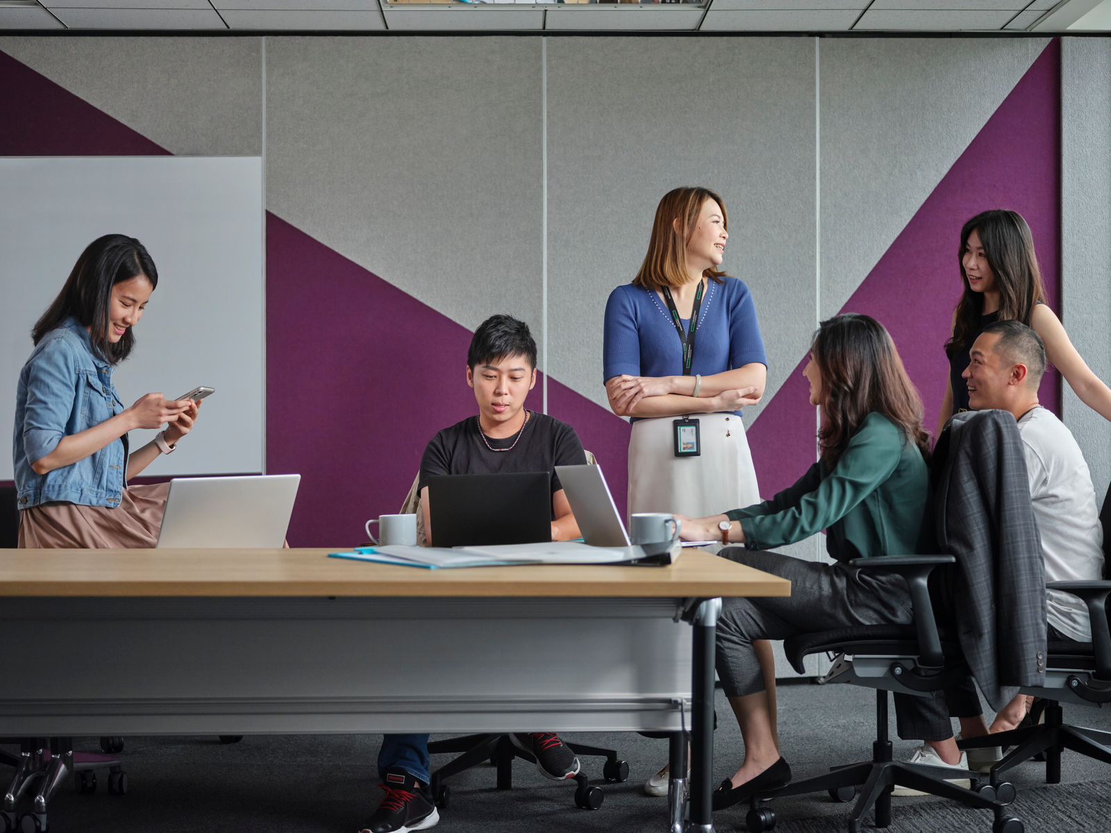 Business people brainstorm in a collaborative workspace